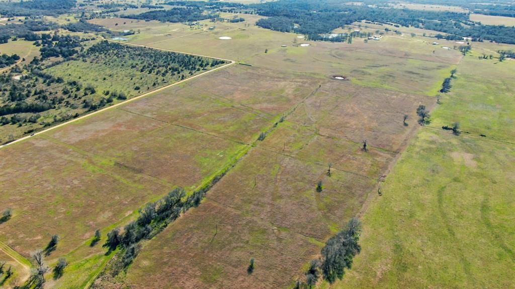 This 68.75-acre tract in Burleson County offers the perfect blend of space, flexibility, and investment potential. Whether you're dreaming of a private ranch retreat, looking to subdivide for multiple homesteads, or seeking long-term land appreciation, this property delivers. The land is cleared and easily subdividable, making it an excellent choice for development. With electricity already on-site, you have a major head start on infrastructure. Light restrictions help protect property values while keeping your options open. Demand for rural Texas land is on the rise, making this a smart investment opportunity. Enjoy the privacy of a large tract while being just a short drive from Bryan/College Station, Caldwell, and Austin. This is more than land—it’s a launchpad for your next great project, whether it’s a sprawling country estate, a family compound, or a strategic investment. Act now before someone else seizes this incredible opportunity!