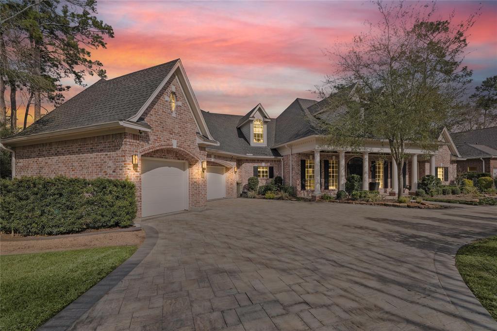 Exquisite Waterfront Living in the Heart of The Woodlands. This breathtaking waterfront home is a must-see to truly appreciate its stunning views and exceptional design. Thoughtfully crafted to embrace the natural beauty of its surroundings, this residence offers direct lake access to Lake Woodlands and includes a private boat dock—perfect for those who love waterfront living. Located within walking distance to Hughes Landing and Market Street, this home offers both tranquility and convenience. Enjoy panoramic lake views from nearly every room, creating a seamless blend of indoor and outdoor living. Recently fully renovated by Rainy Richardson Interiors, this masterpiece features high-end finishes throughout. The outdoor space is equally impressive, boasting a resort-style pool, a fully equipped outdoor kitchen, and ample space to enjoy the serene waterfront setting year-round. This home offers the perfect balance of luxury and lifestyle.