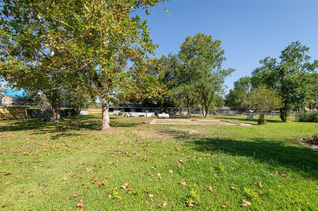 Welcome to 8100 Bender Road, a HUGE lot of 3.12 acres with a charming 3-bedroom, 2-bathroom home offering 2,219 sq ft of comfortable living space in the heart of Humble, TX. This well-maintained property features a spacious layout, perfect for both relaxation and entertaining. Conveniently located near major highways, shopping, dining, and top-rated schools, this home provides the ideal blend of comfort and accessibility. Don’t miss this incredible opportunity—schedule your showing today! Some of the huge ticket items, such as the widows are just a couple of years old!