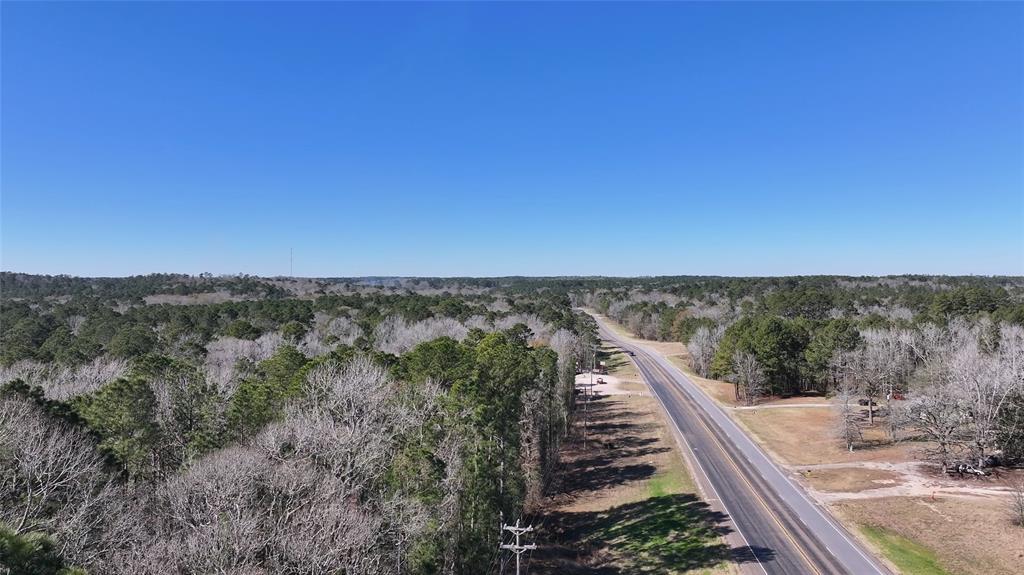 Over 150 feet of road frontage. Escape to the serene beauty of Southeast Texas with this exceptional property, offering a unique blend of convenience, natural splendor, and limitless potential. Located less than an hour from The Woodlands, 1.5 hours from Houston, and a mere 20 minutes from Huntsville, this land provides the perfect balance of rural tranquility and easy access to urban amenities. Plus, you're less than 2 miles from Lake Livingston! Build your private dream estate with panoramic views and rolling terrain. Develop multiple family homes for a peaceful retreat. Create a recreational haven for outdoor adventures for you, your family and friends. Up to 82+/- additional acres available adjoining the property which includes 2 other owned access points. Timber Exemption in place - Low Taxes. Opportunity for potential mineral rights.

Read More