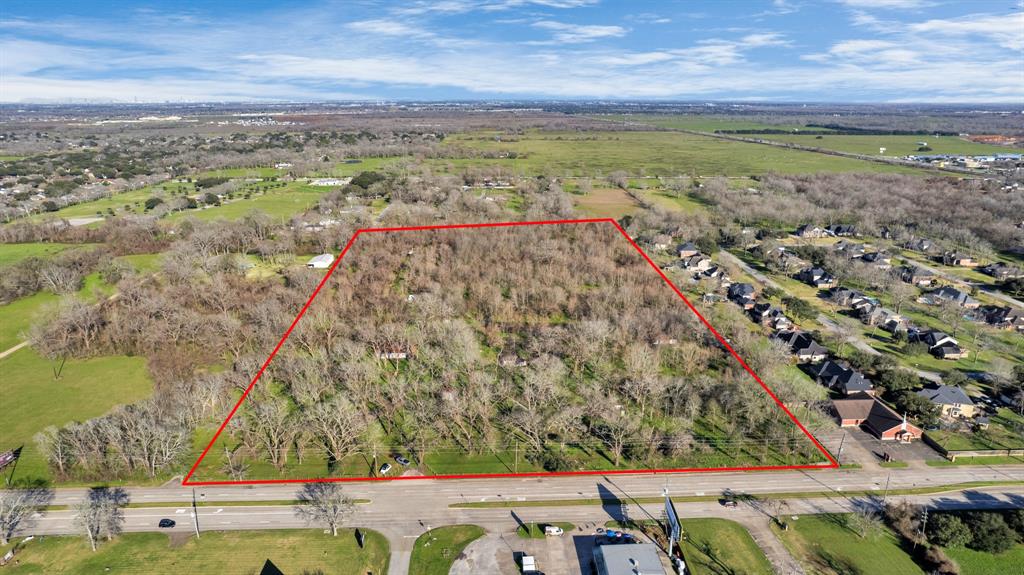 This expansive 25.15-acre property offers exceptional potential in the rapidly expanding Richmond area, with convenient street access to both Melody Ln & Pitts Rd. Boasting over 771 feet of FM 359 road frontage,  this land presents a versatile opportunity for commercial development, residential expansion, or a private homestead tucked among the trees. The property can be divided to suit your needs, making it an adaptable investment for various uses. Property is two parcels with two tax numbers.  Located in growing & desirable Fort Bend County, this prime location is near the booming communities of Harvest Green & Indigo as well as the commercial growth along Grand Parkway (99). The rapid residential & commercial expansion along FM 359, stretching all the way to Fulshear, further enhances the property’s value, ensuring high visibility & accessibility in a thriving market. Whether for investment, business, or personal retreat, the possibilities here are endless. Grow in Richmond, Texas!