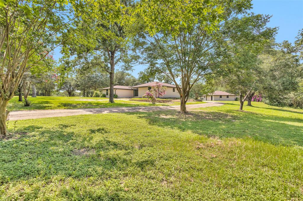 Outstanding 4.129-acre tract with completely renovated 2502 SF brick home plus 1,700 SF workshop located between Navasota and Anderson on CR 409.  You will not find a prettier tract. This property features a mix of oaks, crepe myrtle and other beautiful mature trees and backs up to Spring Creek near the C-Force water bottling plant on Hwy 90. Bring your pets, toys and children to enjoy peaceful country living in a rare opportunity to have it all in an unrestricted clean environment. Large open spaces with a split floor plan make this home very easy to entertain in or just enjoy comfortable family living. No restrictions allow for building a second family home OR a business on site. Easy to show call the office or showing smart for appointment.