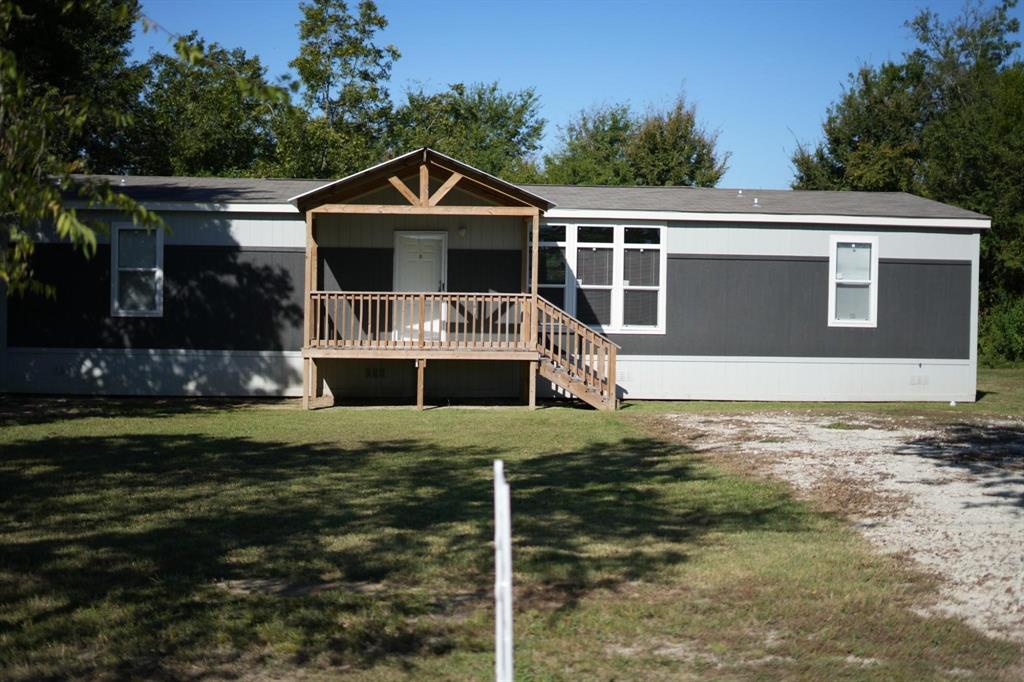 Where are my buyers looking for a new-fashioned mobile home in a quaint area? This beautifully designed 2023 mobile home offers modern living on an easily maintained .42-acre lot, perfect for those seeking peace and quiet. Not to mention, it is still only a 30-minute drive to Bryan-College Station. Property Features an open floor plan to enjoy a bright, airy layout with lots of natural light. Kitchen appliances included along with plenty of counter space, and a convenient island make cooking simpler for you. Spacious master suite with en-suite bathroom along with two other bedrooms, and an additional 1.5 bathrooms. Better yet, this home includes an extra flex room to make into whatever you may need. Nestled in a quiet community, offering a perfect escape from the hustle and bustle while remaining conveniently close to local amenities. This property is a wonderful opportunity for anyone looking to enjoy a tranquil lifestyle. Schedule your showing today!