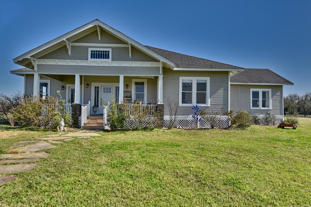 Nestled on 17.5 acres of serene countryside, this beautifully renovated farmhouse is located just outside of Bellville. The 3402  square foot  home has 4 bedrooms, 3.5 bathrooms and an additional flex space that could be used as a bedroom or office. Hardwood floors and tall ceilings highlight the timeless appeal of this classic farmhouse, while thoughtful updates throughout ensure convenience and style. The kitchen features custom cabinetry, and a large island perfect for entertaining. The open-concept living and dining areas are filled with natural light, creating a warm and inviting atmosphere. Outside, the 17-acre property offers ample space for outdoor activities, gardening, or simply enjoying nature. This property is to be sold turnkey, all furniture and accessories are included in the sale of this property. Don’t miss the opportunity to own a piece of history with all the comforts of today.