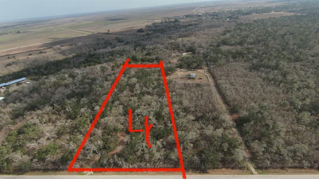 Nestled on a 6.5 acre wooded lot near the beach and Matagorda Bay, this property offers a serene escape. Ideal for building a private retreat or admiring nature's beauty, the land boasts mature trees, wildlife, and tranquility. Drive approximately 150 ft long has been cleared and culvert installed winding to the perfect homesite.  Adjacent 6.5-acre Lots 5 & 6 are also available totaling 16.5 acres. With no restrictions, this parcel requires well and septic for a residence. 
A survey and elevation report are available.