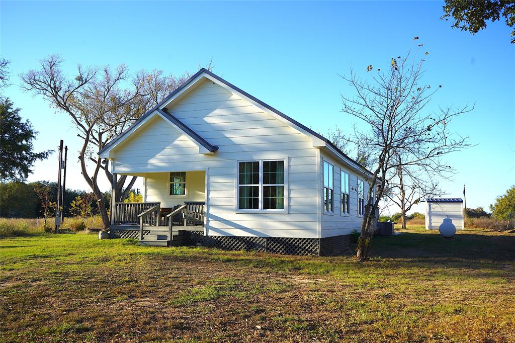 CHARMING COMPLETELY REMODELED 1930'S FARMHOUSE ON OVER 3 ACRES BACKING TO LAKE SOMERVILLE. 20 min to Round Top, Brehnam and Gittings. Home has orignial shiplap and beadboard, pine floors, new roof, electrical, plumbing, windows, siding, insulation, appliances and much more. Fully furnished with all appliances including washer and dryer. Peaceful retreat close to Houston and Austin. Shipping container included for storage or workshop.