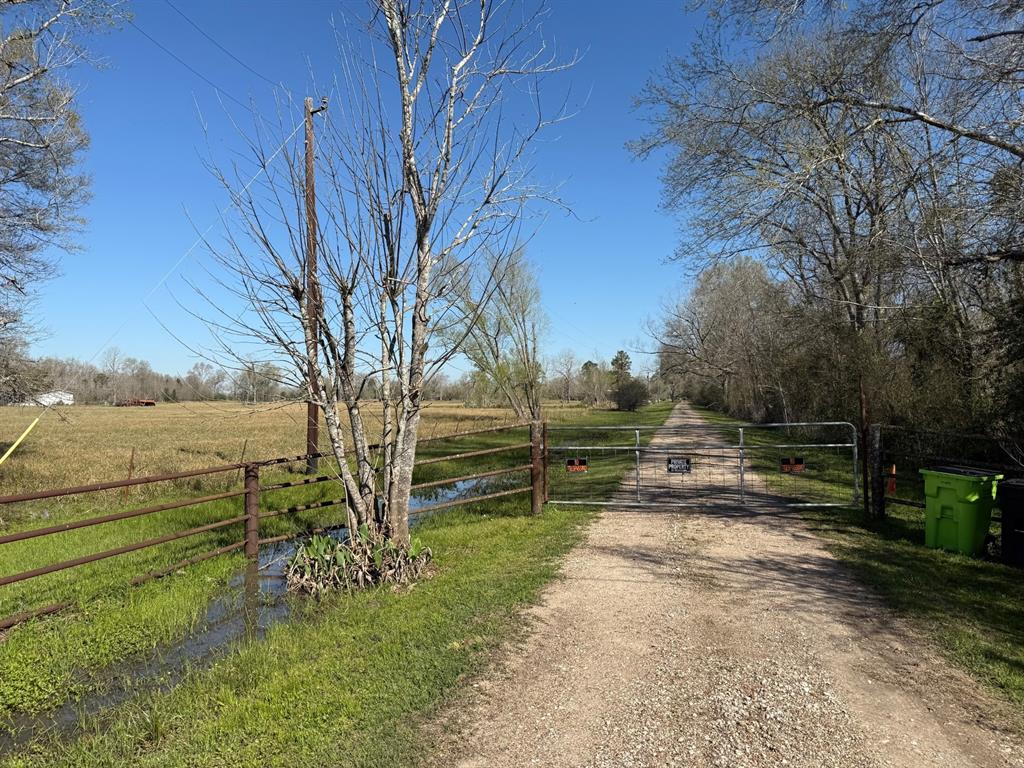 Farm and Ranch landscape with no restrictions offering nearly 75 acres of dreams and possibilities on Highway frontage.