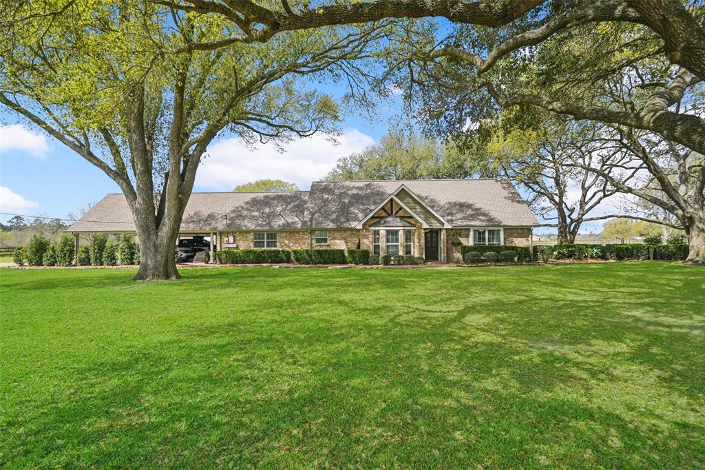21511 Kickapoo Road Waller, Texas This beautifully maintained 3+ bedroom, 3-bathroom home in desirable Waller ISD combines comfort, functionality, and country living. The open-concept living area includes modern amenities, a sunroom, guest suite w/ kitchenette, and extra storage in a climate-controlled attic. Outdoors, enjoy an expansive covered patio, back porch, outdoor kitchen, and firepit surrounded by majestic live oaks. Equestrian enthusiasts will appreciate the 2,000 sq ft lighted arena, barn with AC'd office, tack room, workroom, hay loft, and four spacious stalls. Overhangs provide additional space for trailers and equipment. The fully fenced and cross-fenced property includes 30 & 50 amp RV hookups, an electric gate, and significant road frontage. Additional features include an ADT security system, cameras, and a sprinkler system. Move-in ready, this home offers the perfect blend of comfort and country charm. Don’t miss the chance to make this dream property yours!