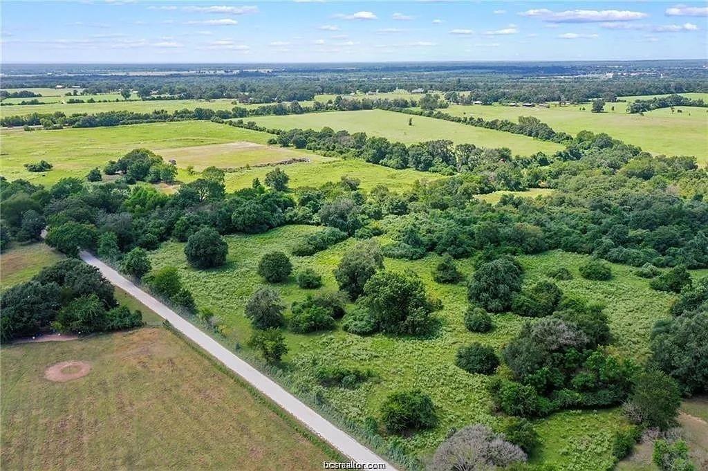 Looking for a peaceful getaway? Look no further than this beautiful 11.66 acre tract -- tucked away in Normangee, Texas -- Halfway between Houston/Dallas/Austin and only 35 Minutes from Bryan/College Station. This little slice of country heaven is ready for you to build your dream home or just have yourself a little country get away. Scattered oak trees, nice pond, dark nights, and the tranquility of the country are just a few things that will beckon you home each day. No restrictions. Electric at road. Call today for more information!