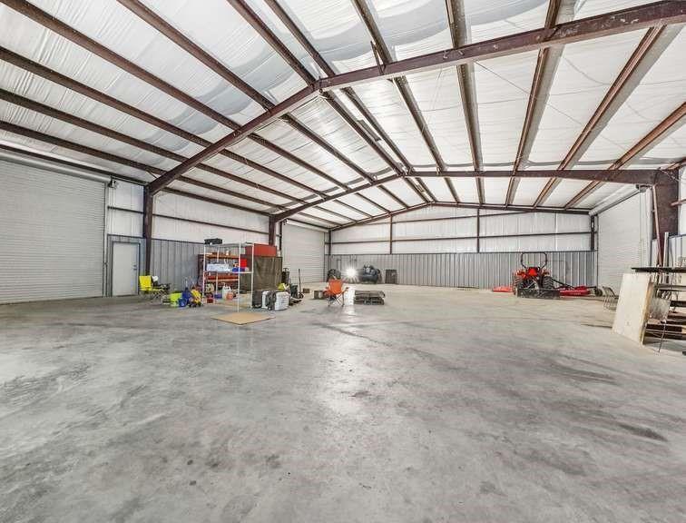 This property is centrally located between Baytown & Humble / Atascocita. This property can be Residential / Commercial! HUGE warehouse can be used as Rent Hall, Ballroom, Mechanic Shop, endless of opportunities. This meticulously crafted 2-story metal Barndominium, constructed in 2018, spans 6,000 square feet, with 1,500 square feet dedicated to living space.The home features 2 bedrooms, 2.5 bathrooms, a home office, and an upstairs loft. The spacious kitchen boasts ample counter space, a walk-in pantry, electric appliances, and an oversized counter peninsula that doubles as a counter-height table. Additional highlights include a generous laundry room with abundant storage, a home office that opens into a workshop, & a master suite featuring a freestanding soaking tub, walk-in shower, and a double sink vanity. The second floor offers additional space for a future loft, with materials already included for completion.doors, you'll find two expansive covered patios, each measuring 60x16.