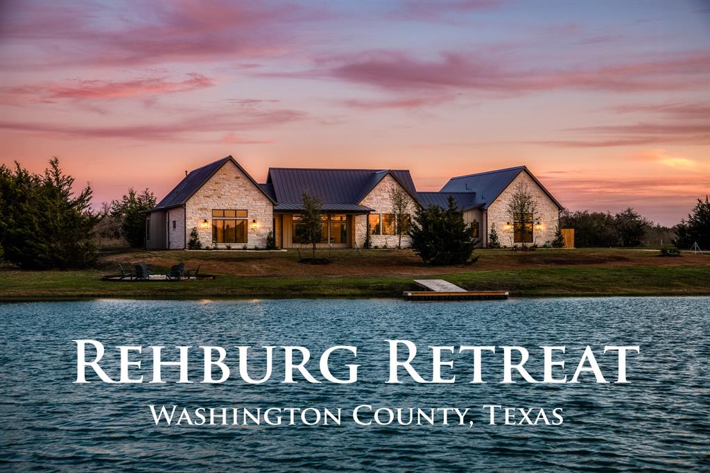 Welcome to Rehburg Retreat, where luxury meets tranquility! As you approach the gated entrance, you're greeted by a stunning view of the home set against miles-long southern views. The newly constructed barn with a 10' porch sits just to your right, offering generous storage space and convenient pull-through doors. Continuing along the drive past the stocked pond, you arrive at the impressive 3,132 sqft home

The home itself offers 4 beds & 3.5 baths, providing ample space for a family or plenty of room to host guests. The kitchen is a home chef’s dream, boasting Thermador appliances, an expansive island for meal prep, and an oversized pantry. Large windows throughout flood the space with natural light and frame picturesque views at every turn

Picture yourself unwinding on the spacious back porch watching the kids reel in fish from the dock while friends gather around the crackling stonework fire pit

Located less than 20 mins from downtown Brenham

Owners are licensed agents