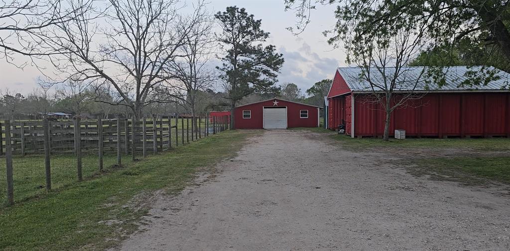 Welcome to 1001 Indian Shores, a 5.1-acre farm/ ranch in Crosby, TX, a fully fenced property offering Agricultural & Timber Exemptions for low taxes, no restrictions, no HOA, and unlimited potential.  This retreat features four pastures and a pecan orchard with 43 mature trees. The 35’ x 180’ barn includes wrangler quarters, a kitchenette, and a bathroom, plus 20 horse stalls with electricity and sockets. Amenities include a 175’ deep well, 36x15 concrete wash rack, 50x50 round pen, catch pen, and tack room. Two are two large storage containers measuring 41x40.7 that will be included in the sale.

Conveniently located minutes from FM 2100 with a variety of nearby amenities in the city or nearby neighboring communities such as Atascocita, Dayton, and Huffman. Book your tour today—this one won’t last long!