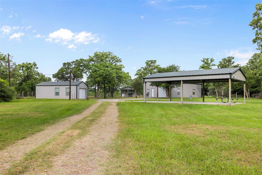1072 Papenberg Lane Columbus, Texas Charming Country Retreat on 2.5 Acres – Minutes from Columbus & Big Easy Ranch!
Don’t miss this unique opportunity to own a peaceful slice of the country just outside Columbus, TX! This 2.5-acre property features a well-maintained 2 bedroom, 1 bath barndominium with an open-concept layout, offering both comfort and functionality. Also included is a separate 1 bedroom, 1 bath guest barndominium—perfect for a mother-in-law suite, visitors, or rental potential.
Enjoy outdoor living with a carport/gazebo ideal for gatherings or relaxation, a metal garage with a workspace and an additional metal storage building for all your tools and equipment. Located down a quiet country road, this property offers privacy and space, while still being conveniently close to town amenities and the prestigious Big Easy Ranch.
Whether you’re looking for a full-time residence, weekend getaway, or investment opportunity, this property checks all the boxes!
Buyers agent to verify all information.