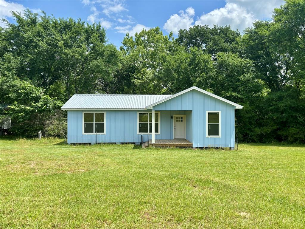 2077 County Road 408 Navasota, Texas This 10-acre property offers a blend of privacy, beauty, and potential. With both wooded and open pasture areas, you will have plenty of space to explore and create your homestead. The property includes a 900 sq ft unfinished home, providing the opportunity to complete the space to your vision. The home offers an open concept living space, one bedroom and one bathroom. For extra space there is another 224 sq ft building that can be used for an office or studio. The 20 x 30 RV covering is a fantastic bonus that also features a great wooden porch. There is a container/pole barn for equipment storage. The property conveniently has electricity, a water well and septic already in place. Bee exemption in place and unrestricted.
Items that will convey that will help finish the home build:
Water Filter
Refrigerator
Tankless Water Heater
Wood Burning Stove
Electrical Cable/Wiring
Pull Down Attic Ladder
Kitchen Cabinetry