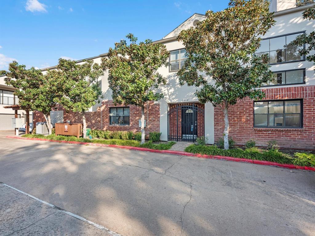 2464 Bering Drive 2464 Houston, Texas Step into style and comfort with this beautifully designed two-bedroom townhome. The soaring double-height ceiling in the living room fills the space with natural light and adds a modern, open feel. The kitchen is equipped with a sleek tile backsplash, double basin sink, and recessed cabinetry, blending function and design. Adjacent to the kitchen, the dining area overlooks a serene private patio complete with a charming fountain—perfect for relaxing or entertaining. Upstairs, you’ll find two spacious bedrooms and a flexible bonus space ideal for a home office, nursery, or guest retreat. With two and a half bathrooms, there’s plenty of comfort and privacy for everyone. Enjoy access to the community pool for sunny days and laid-back weekends. This townhome blends thoughtful design and everyday convenience in a welcoming community setting.