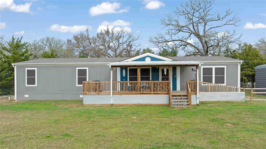 11922 Long Trussel Road Bryan, Texas Nestled in the heart of Bryan, Texas, 4 bedroom, 2 bath manufactured home offers the prefect blend of modern comfort and rural charm. Set on a spacious 5 acre lot, this property offers privacy and convenience, just a short drive from College Station and A & M. Inside, you'll find stylish LVP flooring throughout, complemented by gorgeous butcher block countertops in the kitchen. Refrigerator, washer/dryer convey with the home.The property boasts a barn and a workshop, generator, mower and grill. With plenty of space to roam, garden, or simply enjoy the peace and quiet, this property has it all. Dont miss this rare opportunity to own a slice of Texas paradise so close to everything Bryan/College Station has to offer!