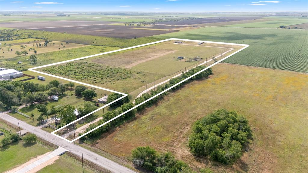 Only four miles from Hwy 59, Quiet country charm is what you will find at 12331 Battle Road. This 22-acre property offers an Ag exemption providing immediate tax benefits thanks to a working Apiary. Whether you're seeking a peaceful rural retreat, a place to expand your homestead, or a future build site with all the essentials already in place, this property delivers. Enjoy peaceful living with a private road, on-site water well, and electricity that stretches from the front to the back of the property. A small barn adds function, while the well-maintained 4-bedroom manufactured home gives you a move-in ready option or a place to live while you build the forever-home. Whether you’re a new farmer or rancher, this property offers the space for creating a quiet country retreat. Soak in the unforgettable Texas sunsets that make every evening feel like a postcard. This is a turnkey setup for builders, investors, or homesteaders. RV hook up as well. Survey available. No Restrictions