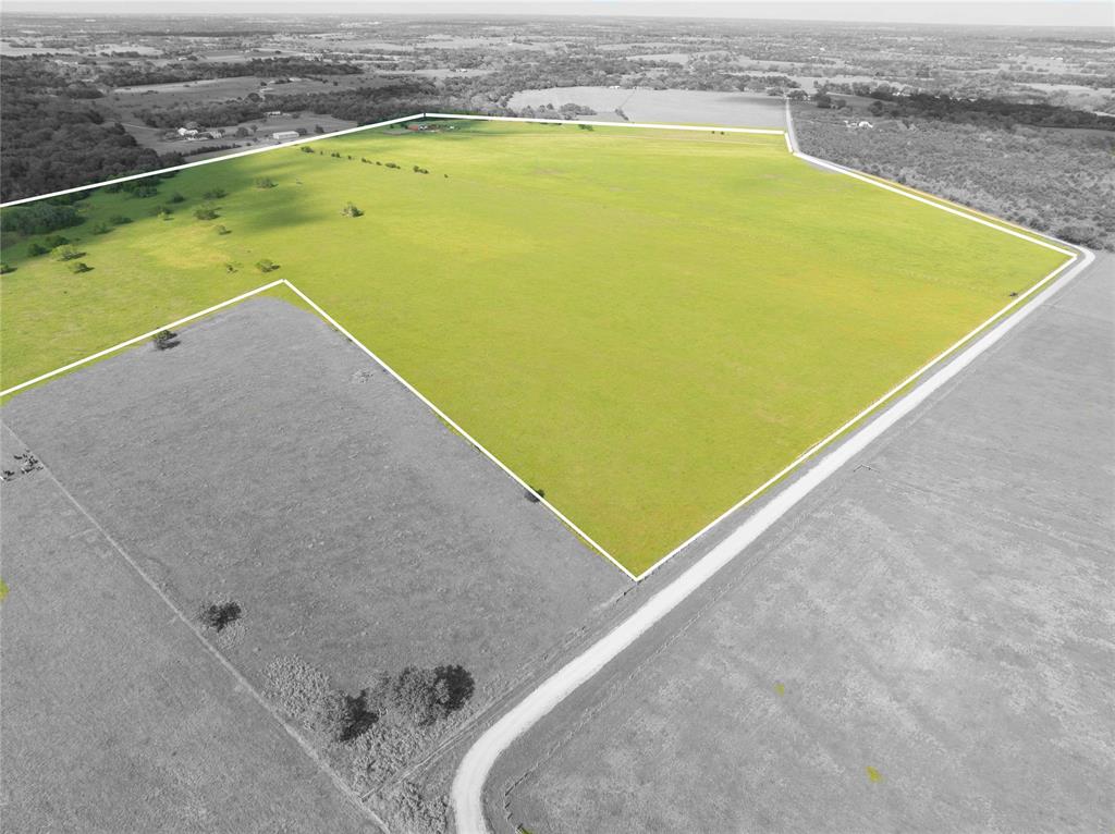 1162 County Road 234b Hallettsville, Texas Welcome to 1162 County Road 234B, a remarkable 121.5-acre property offering a blend of agricultural productivity, development potential, and commercial value. With approximately 2,900 feet of road frontage, this expansive tract provides ample opportunities for subdivision, creating a private estate, or launching a business venture.
Perfect for running a cattle and hay operation, the land is currently planted in improved Bermuda grass and offers wide-open pasture ideal for grazing and production. The property holds a full agricultural exemption, allowing it to be operated tax-free as a business, further enhancing its long-term value and appeal.
Whether you’re seeking a productive agricultural venture, a serene rural retreat, or a strategic investment opportunity, this property delivers. The level terrain, extensive frontage, and rural charm provide flexibility for a variety of uses, from farming and ranching to development or commercial projects.