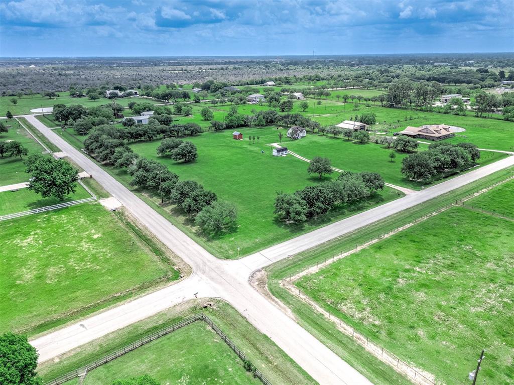 6607 S Mallard Drive Fulshear, Texas Discover the perfect blend of country charm and city convenience with this breathtaking 5.67-acre tract located just off North Fulshear Drive. This beautifully improved pastureland is graced with majestic live oaks that provide shade, serenity, and a picturesque backdrop for your dream lifestyle.The property is fully equipped with septic, well water, and electricity—ready for you to build your custom home, ranch, or barndominium. There’s plenty of room for your horses, barn, or any vision you have in mind. Enjoy peaceful living just minutes from I-10 and the Westpark Tollway. No mobile homes allowed—preserving the value and beauty of your investment. This is more than land—it’s a lifestyle waiting to happen.