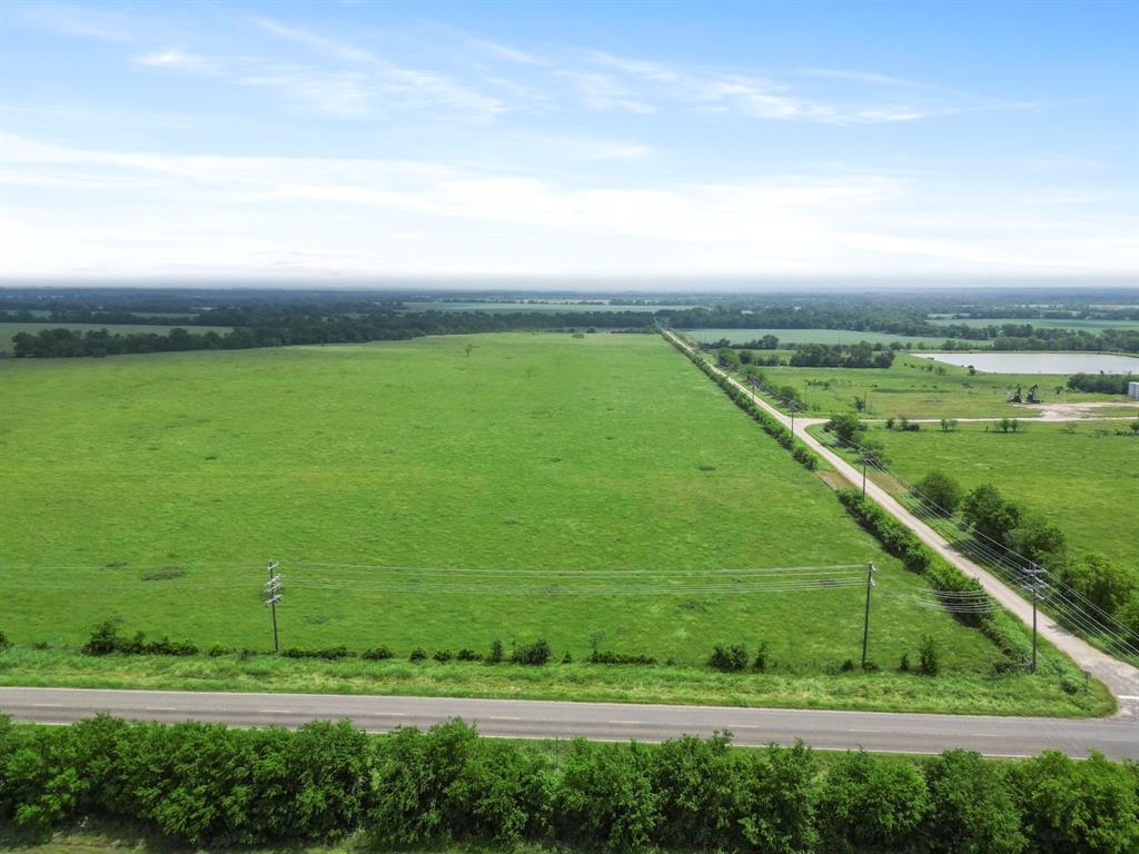 Expansive 36-Acre Corner Lot – Open Pastures in Tranquil Normangee, TX. Discover the perfect canvas for your dreams, offering sweeping open pastures and exceptional road frontage on two sides. This rare find combines wide-open space with prime accessibility—ideal for building your dream home or investing in Texas land with long-term value. The land is fully cleared and ready for immediate use, with rural water and electricity available at the road, simplifying the development process. Currently benefiting from an agricultural exemption, this tract offers substantial tax savings. Enjoy peaceful country living just minutes from the conveniences of Normangee and within easy reach of Bryan/College Station, Huntsville, and I-45 for commuting or travel. Whether you're looking for your next homestead, a weekend getaway, or a smart land investment, this versatile property offers endless possibilities in a serene, scenic setting.