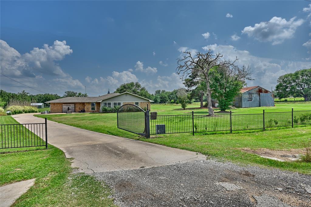 2758 Fm 1361 Somerville, Texas Welcome to cozy country living near Lake Somerville! This charming 3-bed, 2-bath home is nestled on 2 beautiful acres, offering 2,710 sq ft of comfortable, versatile space. Enjoy relaxing evenings in the spacious living room featuring a wood-burning fireplace, work from home in the dedicated office, or energize your day in the bright sunroom—perfect as a gym or reading nook. A large game room provides ample space for family fun and gatherings. Outside, the gently rolling hills and expansive skies create a tranquil atmosphere, while the classic barn includes recent interior upgrades such as a full loft, sturdy workbenches, and extensive shelving—ideal for hobbies or storage. Just 5 mins from Lake Somerville, and conveniently located 20 mins from Brenham and 25 mins from College Station. (See attachments for extensive recent home updates!)