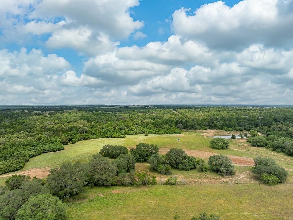 TBD Deer Hollow Road Weimar, Texas This 276 acre tract of land has about everything that most Buyers are looking for with over 3500 ft of Paved Road Frontage (Deer Hollow Road), 4 nice Fishing Ponds, Electricity, good road around the entire boundaries, plus many roads/lanes through-out the property, Rolling Terrain, Heavily Wooded and Open Areas. Wildlife includes White Tail Deer, Turkey, Dove, Feral Hogs and various Varmints. The entire property could easily be HIGH WIRE FENCED for an Exotic Game ranch. The property boundaries are currently fenced with Barb Wire Fencing and many Cross Fences for rotation grazing for Livestock. This property has been used for cattle grazing for the past 40 years. I don't think you can find a better Recreational/Hunting Paradise with 2 hours of Houston.