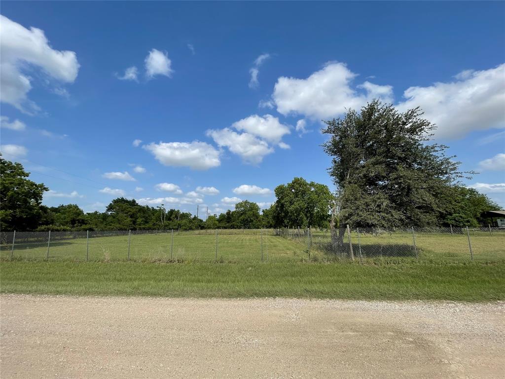 This 2.17 acres is located near  99 Grand Parkway . fenced all around.  Horses allowed ,No mobil homes allowed.
The property is located next to 26239 Sharp Rd, this address can be used as location reference, CAUTION do not enter the property, the neighbor has dogs.