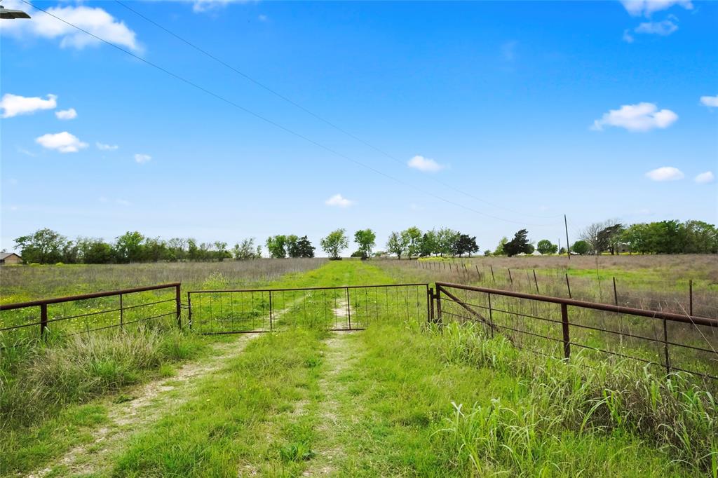 Fm-2502 Burton, Texas Situated on an unrestricted 10 acre tract, this property is perfect for a home, or guest houses during Round Top Antique Weekend. With a well casing, gated entrance, and two ponds, it offers a peaceful retreat in a relaxed country setting. Ample space to bring your vision to life.