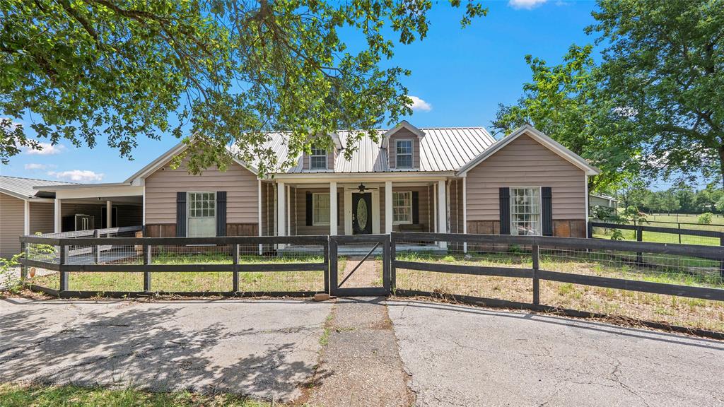 1529 Highway 90 Madisonville, Texas Charming Updated Home on 4 Acres in Madisonville! Discover the perfect blend of classic charm and modern convenience in this beautifully updated 4-bedroom, 3 bath home set on 4 scenic acres in Madisonville. This older home retains its character with features like a cozy wood-burning fireplace and built-in storage in the bedrooms, while offering modern upgrades throughout for comfortable living. Step outside onto a spacious deck—ideal for entertaining or simply enjoying the peaceful surroundings. The property also includes a versatile apartment/shop equipped with A/C and a full bathroom, perfect for guests, a home office, or additional income potential. A circular driveway adds convenience and curb appeal, completing this unique property that offers privacy, space, and functionality—all just minutes from town.