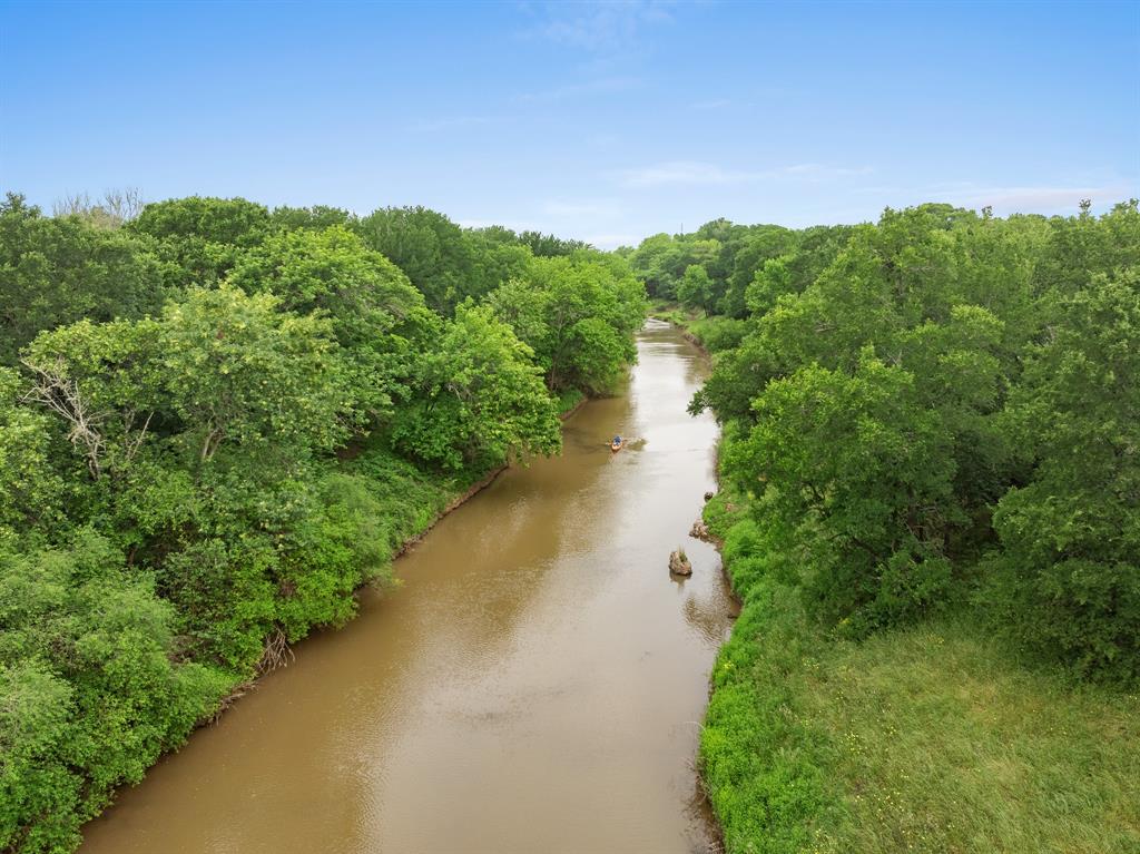 86.32 Ag-Exempt acres just outside Bryan city limits and located less than one mile from the expanding RELLIS Campus! Over 2,500 feet of State Hwy 21 road frontage & nearly 2,300 feet of Little Brazos River frontage. Property benefits from high traffic counts, exceptional visibility, & close proximity to ongoing, extensive new development plans focused on research, technology, education, and infrastructure. The major growth corridor is open to a variety of uses, including recreational (along the non-navigable Little Brazos River), agricultural, research, tech-related, outdoor event spaces, or flood-resilient development. Outstanding opportunity for creative developers to capitalize on proximity to Bryan-College Station booming innovation district and Texas A&M influence.