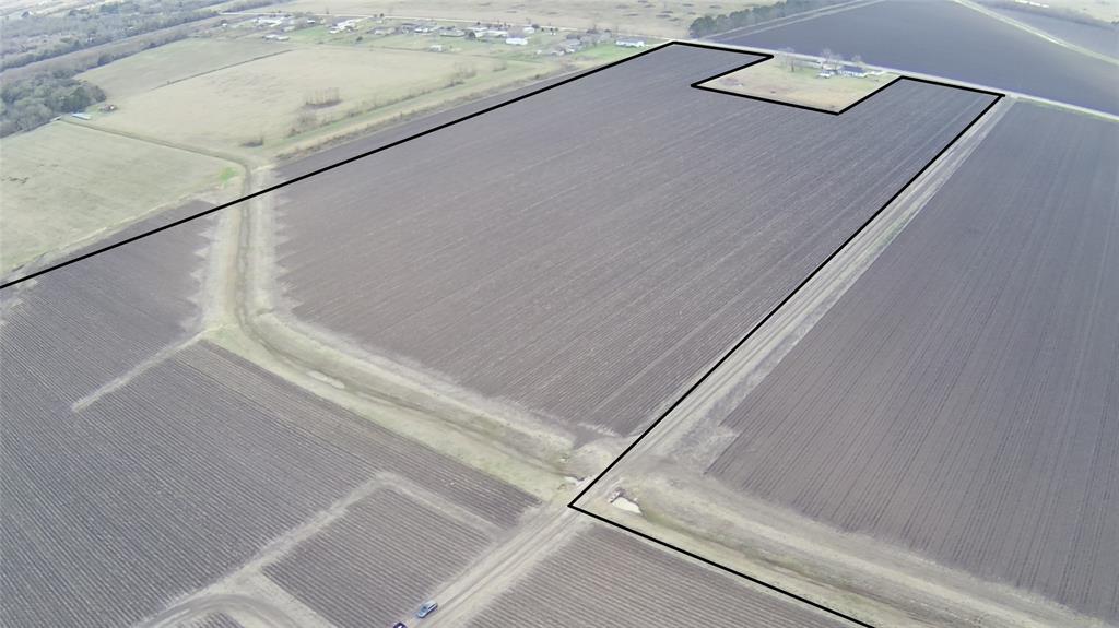 62+/- acres used for farming and 28+/- acres used as cattle pasture. The cattle pasture is fenced. Additions include a 30x60 shed and also a corral and barn. There is an active electric pole near the barns connected to a functioning water well. Approximately 538 feet of road frontage to Zamanek Road. Easy access to FM-1994, FM-361 and Hwy 36. Close proximity to new development Austin Point.