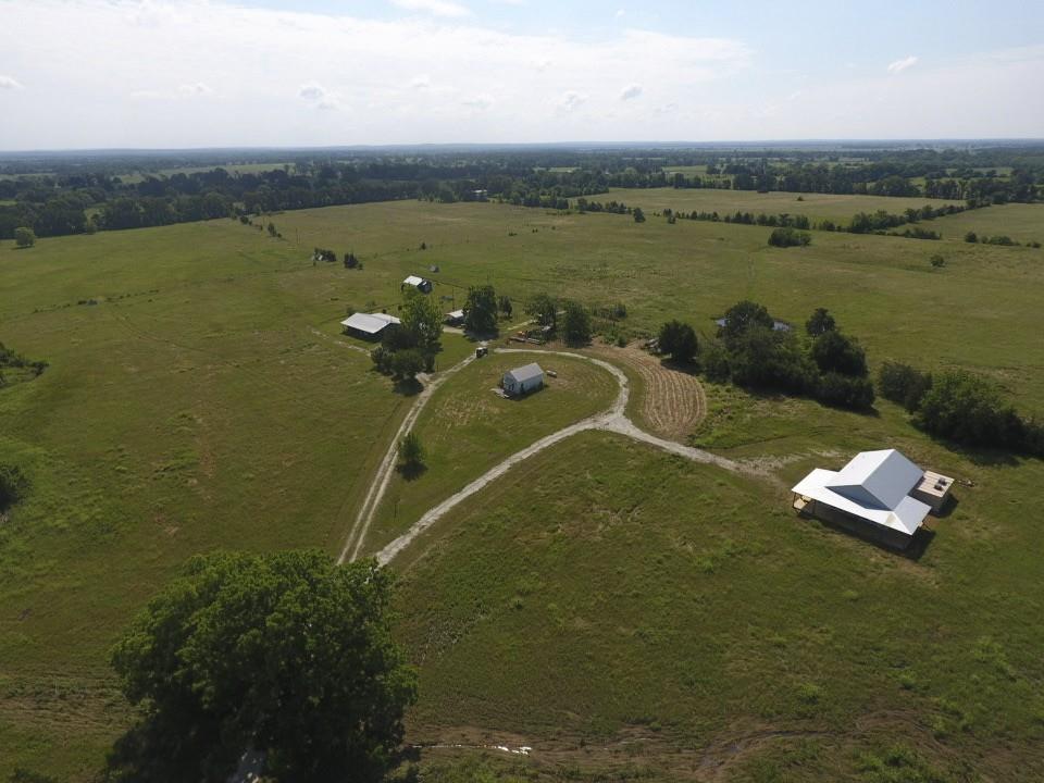 8698 County Road 239 Oakwood, Texas Remarks: Uniquely special property 61 acres fenced and cross fenced. Set up for rotational grazing. New water well piped to all pastures. Main house is older very livable has some foundation ups and downs. Behind the main house is a new outdoor kitchen area that has all of the bells and whistles. Out from the main house is a separate little studio with a bathroom and out from that is a very nice structure currently used as a classroom. It has a kitchen and bathroom all new. Main house and studio have Generac standby generators. This property is currently used for a farm to table style of living. To much much stuff to list possibilities are endless.