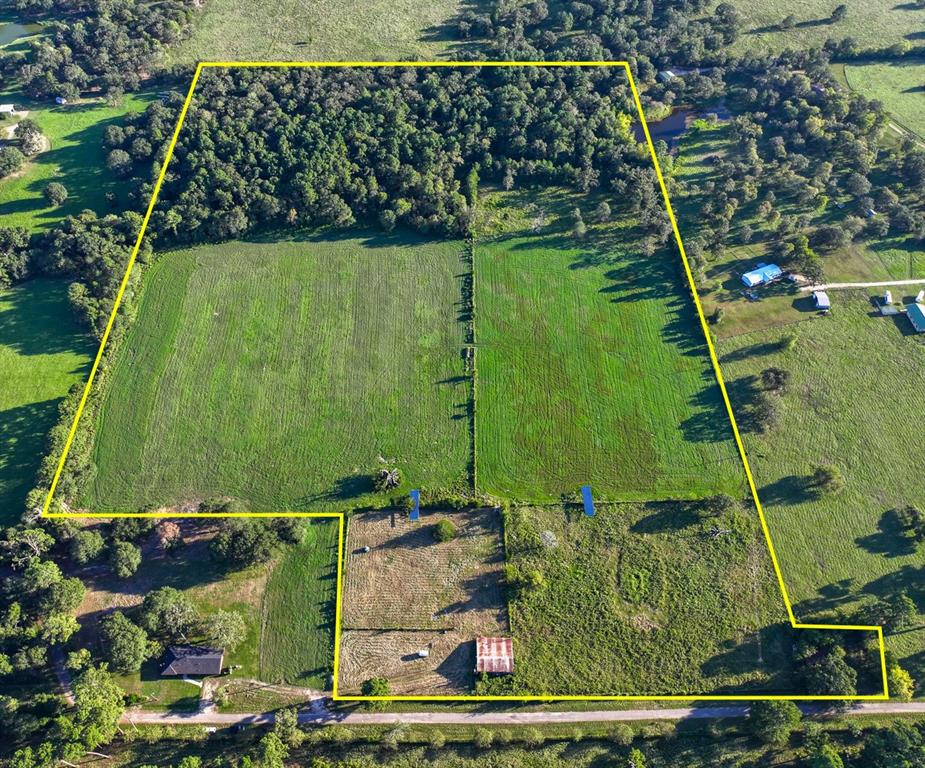 Your Country Escape Awaits! 
Discover this peaceful country property, complete with a barn on 39+ unrestricted acres. Just minutes from I-45, yet still on a low-traffic, county-maintained road. It is ideal for horse lovers or those looking to build a family homestead, hobby ranch, or recreational retreat—with fiber optic internet available. The property boasts mature oak and pine trees, making it perfect for outdoor activities and hunting. 

A 30' x 50' barn with a 14' x 50' addition, concrete floor, electricity, and horse stalls adds extra value. The property also includes improved pasture with Jiggs/Coastal Bermuda grass, a wooded area teeming with wildlife, a seasonal creek, and a shared pond. 

Schedule your appointment today!