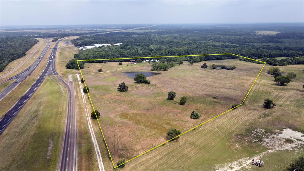 7319 Highway 6 Navasota, Texas Mixed use commercial opportunity! This beautiful 32+/- acre tract sits right along the Hwy 6 feeder road just North of FM 3090. With approx. 875' of frontage along the feeder road, development options for this sprawling tract are almost limitless. 7.3 acres along the road are within Navasota City Limits, currently zoned B-2 while the back 24 acres are outside the City Limits and offer agriculture/residential opportunities. High visibility and easy access create a wonderful location for a variety of businesses. Divisions are possible. Contact Miriah for additional information.