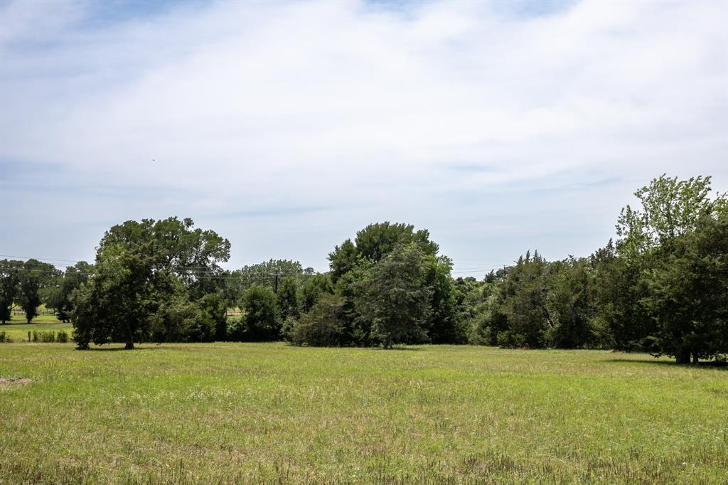 5427 Mustang Road Brenham, Texas Exceptional opportunity to buy 8.107 acres that is close to Brenham without having to get on the highway! Beautiful property with rolling views of the countryside that has paved road frontage, new gravel driveway, electricity, water well and septic in place! This lovely property is ready for you to build on. Property also includes ag valuation for honey bees. Owner has added an RV cover with 30 amp plug & sewer line, small storage building and installed 2 culverts. Property affords nice privacy with a buffer of trees along Mustang Rd while offering scattered trees amongst the tract for a nice mix of open and woods. West boundary of the property has seasonal creek with multiple tree species along its border and attracts year-round wildlife for you to enjoy watching. Do not miss this opportunity to purchase small acreage that is ready to enjoy! Need more acreage?? The adjoining 5.25 acres can also be purchased and is listed as MLS#77195715.