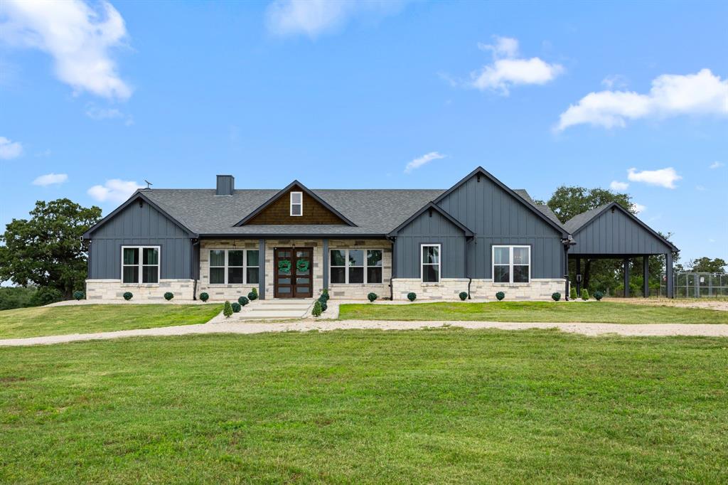 1507 Smith Rau Rd Columbus, Texas Discover the perfect blend of comfort, space, and serenity with this exceptional country home set on 10 scenic acres. The main house offers 4 spacious bedrooms and 3.5 bathrooms, providing ample room for both family living and hosting guests. A beautiful back porch invites you to unwind while taking in the peaceful surroundings, perfect for morning coffee or evening sunsets. Designed for both relaxation and entertaining, the home combines rustic charm with thoughtful modern updates. One of the standout features is the large barn, which not only serves as ideal storage or a workshop space but also includes a fully finished apartment or mother-in-law suite. This additional living space boasts a spacious 1 bedroom, 1.5 bathrooms, and a generous kitchen and living area. Outside, enjoy your own slice of nature with a private pond and a quiet creek that meanders through the back of the property, offering a true country escape just minutes from town.
