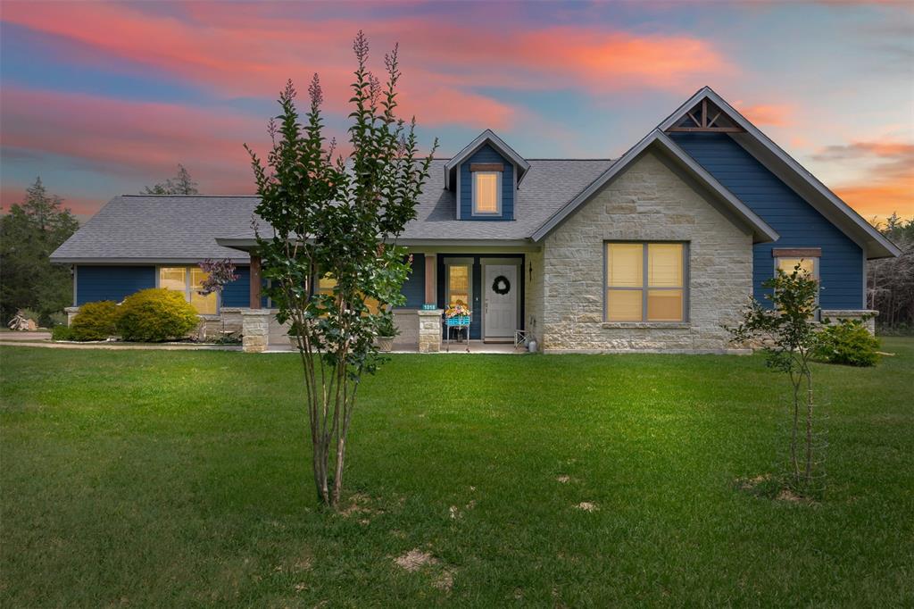 1018 Woodglen Way Cat Spring, Texas Step into this custom-built home exuding hospitality and charm. The open foyer leads to a family room with a wood-burning fireplace, ideal for gatherings. The kitchen features beautiful countertops, abundant cabinetry, and a breakfast bar. Enjoy the spacious dining area and gameroom. The main bedroom offers a sophisticated ensuite with a double sink vanity and walk-in shower. Two guest bedrooms provide ample closet space. With an attached 2 car garage, private back patio, scattered trees, pumphouse/storage shed, and 2 manicured acres in a deed-restricted subdivision. Perfect as a full-time residence or weekend retreat in a very desirable neighborhood. Just 5 miles from New Ulm, 22 miles from Columbus, 30 miles Bellville and 73 miles from Houston. Call today to schedule a showing!
