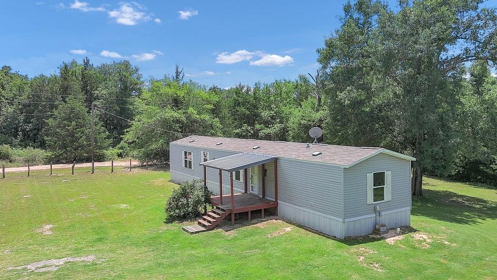 14762 Private Road 4170 Marquez, Texas 2017 Manufactured home on 2 acres just outside Marquez Tx. 3 bedroom and 2 bath. Some improvements to the property include, newer entrance fencing, stock pond, covered carport/work space. No restrictions, minutes outside of town. Secluded and peaceful.