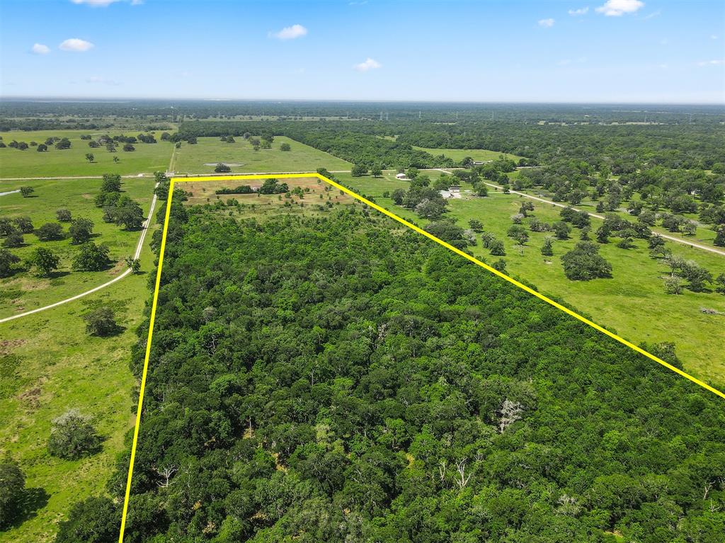 Over 50 acres across 3 combined tracts, being sold for lot value. Ideal for a custom home site, leisure ranch, mobile home setup, or other possibilities. The front 20 acres have been cleared, with the remainder partially wooded. Enjoy ranch-style or farm living with ample space and privacy. Seller has no history or knowledge of the home or property. Incredible opportunity with tons of potential—don’t miss out!