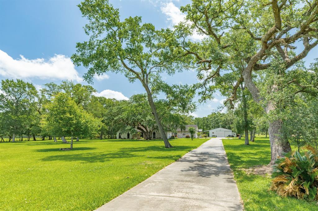 Experince tranquilty on this 10 acre property tucked way back in the trees. This 2700 sq ft well maintained home boasts the luxury of privacy and peacefulness all in one home.  From the moment you arrive your captivated by the beautiful trees scattered across the property. Double driveways for easy access and lots of parking. This property is set up for investment opportunities or multigenrational properties. Gardening activist will love this generously sized fenced gardening area to protect produce from all the wild life visitors. Once inside youll love the open concept and privacy driven layout with all bedrooms split making the living, dining, and kitchen the heart of the home. Recently renovatoved primary bathroom offers luxury for the owner. Scenic views from every room. Large kitchen perfect for entertaining and a nice size flex room. Spa room screened and covered. Functional workshop with covered deck and above ground pool. You dont want to miss this unique opportunity.