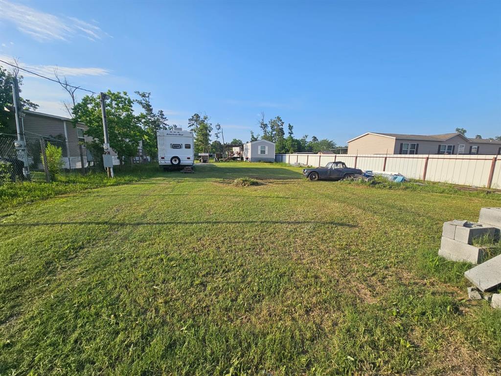 60 County Road 5035 Road Cleveland, Texas Welcome to your new home! This beautifully maintained .43-acre property offers everything you need for comfortable, secure living. Located in a peaceful area, the land is already cleared and ready to enjoy.
At the heart of the property is a 2021 16x66 single-wide manufactured home, featuring 3 spacious bedrooms and 2 full bathrooms. The home is modern, clean, and move-in ready—perfect for families, first-time buyers, or anyone looking to settle into a quiet, well-equipped space. Whether you're looking for a permanent residence or a weekend retreat, this property offers peace of mind with secure access and essential utilities already in place. Don’t miss this opportunity to own a ready-to-enjoy property!