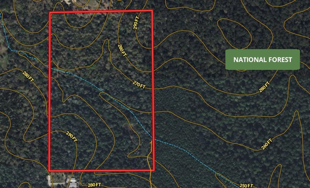Heavily wooded 35-acre tract on Bailey Grove Rd in Montgomery, TX—unrestricted and full of potential. This private, serene property features a dense mix of mature hardwoods and pine, offering excellent cover for wildlife, natural beauty, and a peaceful setting for your dream home, weekend retreat, or recreational use. With no HOA or deed restrictions, the possibilities are endless—build, hunt, explore, or develop as you choose. Conveniently located near Montgomery, Lake Conroe, and The Woodlands, yet tucked away for privacy. A rare opportunity to own unrestricted acreage in a growing area. Buyer to verify utilities and access.
