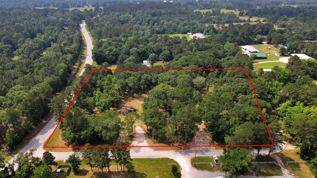 3.89 cleared unrestricted acres with frontage access to FM149.