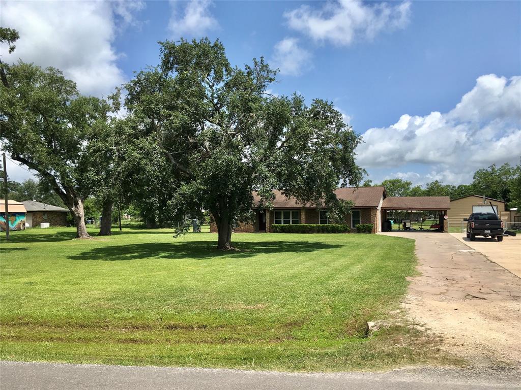 Country Living with Modern Comfort. 4/2 on 1 unrestricted acre in Angleton! Your dream of peaceful, unrestricted country living is here! This beautifully renovated home includes an additional office/flex room perfect for remote work, hobbies, or guest space. Fully renovated in 2019, the home combines classic charm with modern updates: septic system installed in 2019, PEX plumbing throughout 2021, HVAC system installed in 2023, upgraded interior with stylish finishes & fixtures. Enjoy the privacy of a fully fenced backyard, ideal for kids, pets, or entertaining. Need extra storage or workshop space? The property features a large 26' x 30' x 12' shop, perfect for projects, business equip., or outdoor toys. There's also an attached carport for convenient covered parking. Don't miss out on this rare find! Schedule your showing today and make this slice of country paradise your own! Located minutes from downtown Angleton but far enough out for peace & quiet. HURRY! Won't last long!!!