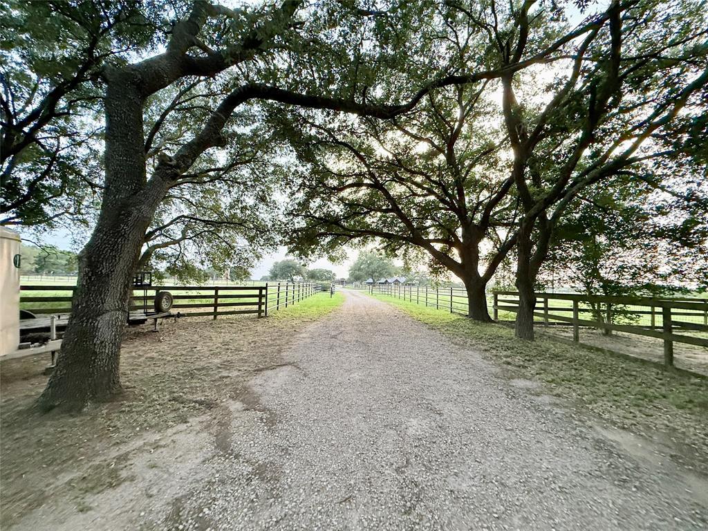 12.95 Acres – Prime Unrestricted Land in NW Houston Growth Corridor

Rare opportunity to own 12.95 unrestricted acres in the booming Northwest Houston market area. Ideal for commercial development, residential use, RV park, horse farm, or mixed-use. Property features a charming ranch-style home nestled under majestic live oak trees, several outbuildings, a well-maintained barn, and lush, open pastures. Located in the direct path of growth—this is a versatile investment with endless potential. Don’t miss out!
