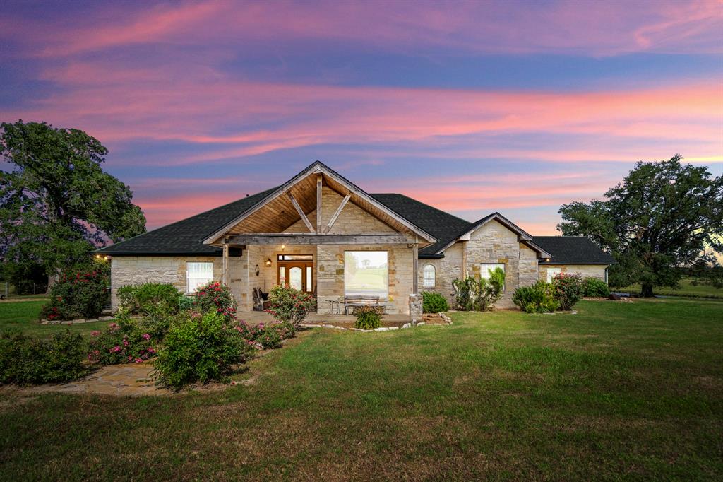 6923 CR 3271 Buffalo, Texas Stunning 131-Acre Estate in the Heart of Leon County – Buffalo, TX
Welcome to your private East Texas paradise! Nestled atop a scenic hill in Buffalo, Texas, this exceptional 131-acre property offers the perfect balance of rolling pastureland, mature hardwoods, and breathtaking views. Whether you're seeking a luxury ranch lifestyle, a private retreat, or an equestrian haven, this one-of-a-kind property delivers.
At the heart of the estate sits a 2,737 sq. ft. custom rock home, thoughtfully positioned to capture panoramic views of the countryside and overlook a fully stocked 7-acre lake. The home exudes rustic elegance, with quality finishes and ample space for both entertaining and everyday living.
For horse enthusiasts, the property boasts a pristine horse barn featuring a fully functional efficiency apartment, multiple horse stalls, and turnout runs—perfect for training, boarding, or personal use. An additional multi-purpose barn adds even more flexibility with extra horse stalls.