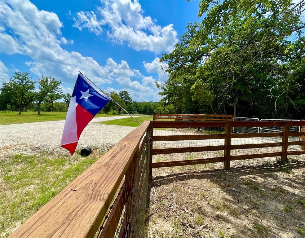 Whether you are finally ready to move to the beauty and freedom of the country or want to secure that weekend escape from urban life, this land comes loaded with hard-to-find value, charm, and location. This 1.76+/- acre tract at Stetson Range, is already prepared for your vision to become a reality at your direction. The land comes complete with electric utilities available at the rear property line, fiber optic high-speed cable, and water meter installation at the frontage!  The land is perimeter fenced with high-quality 4-board equestrian fencing along the frontage and 2 x 4 no-climb welded horse fencing along the other three perimeter lines. The land has nice hardwood oak trees, among other species. The location is highly desired. Located within a very easy two-hour drive or less from Houston, Dallas, and Austin city limits, it is also a bedroom community drive to SEC country in Bryan/College Station. It has excellent area features and recreation amenities. Call for more 411/visit.