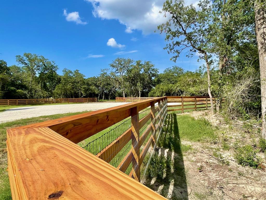 Whether you are finally ready to move to the beauty and freedom of the country or want to secure that weekend escape from urban life, this land comes loaded with hard-to-find value, charm, and location. This 1.43+/- acre tract at Stetson Range, is already prepared for your vision to become a reality at your direction. The land comes complete with electric utilities available at the rear property line, fiber optic high-speed cable, and water meter installation at the frontage!  The land is perimeter fenced with high-quality 4-board equestrian fencing along the frontage and 2 x 4 no-climb welded horse fencing along the other three perimeter lines. The land has nice hardwood oak trees, among other species. The location is highly desired. Located within a very easy two-hour drive or less from Houston, Dallas, and Austin city limits, it is also a bedroom community drive to SEC country in Bryan/College Station. It has excellent area features and recreation amenities. Call for more 411/visit.