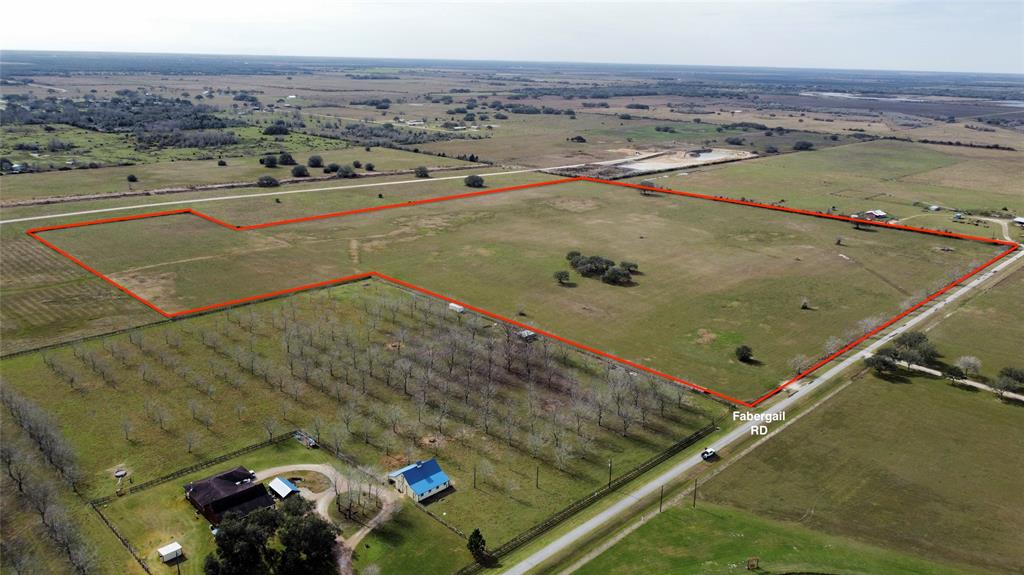 Unrestricted - 49.08 Acre Tract of land located off of HWY 71 in Midfield! Beautiful place to build your private home, ranch, or keep as is for an investment! Property is off of Fabergail Road with trees lining the front and a large cluster of trees in the center. Current owner has invested in this property by having it land planed, and triple plowed and property drains great! Call and schedule your private showing today!