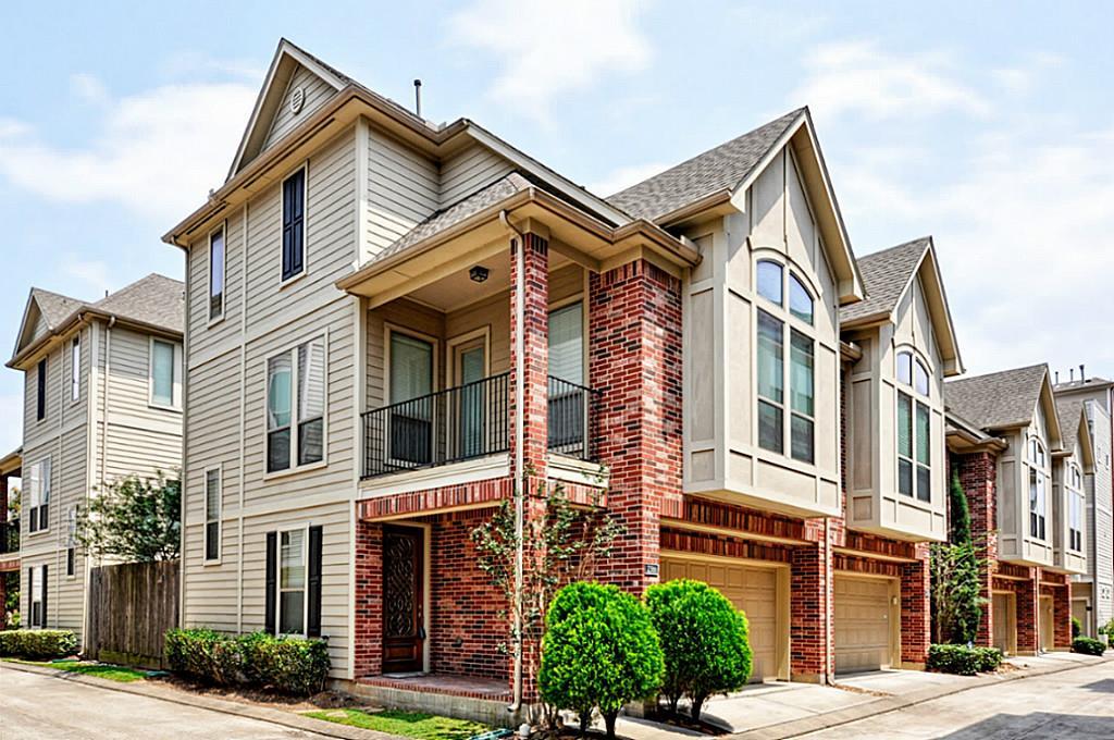 2366 Bastrop Street Houston, Texas FANTASTIC LOCATION! Experience sophisticated living in this beautifully crafted Perry-built townhome, ideally situated in a secure gated community with effortless access to the Medical Center and downtown Houston offices.
The main living area showcases elegant hardwood floors and sunlit windows that create a bright, inviting atmosphere with flexible space to accommodate any furniture arrangement. The chef-inspired kitchen features a spacious island, gleaming granite countertops, and stainless steel appliances. The dining area offers an ideal setting for casual breakfasts or memorable family dinners. The expansive Owner’s suite boasts a luxurious en-suite bath with dual sinks and a large shower complete with bench seat. A secondary bedroom provides private exterior access to the patio, while an additional second-floor balcony extends your living space outdoors. Included appliances such as the refrigerator, washer, and dryer add convenience to this move-in-ready home.